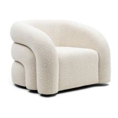 Draaibare fauteuil Vittorio met zachte bouclé stof en elegante rondingen, perfect voor een moderne, luxe uitstraling.